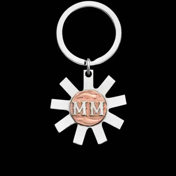 "Our Wild Wild West Custom Keychain is as rustic as the rowels on your spurs. Crafted on a German Silver base, customize your lettering to stand out on the Copper background with hand engraving. This rowel keychain is a pure representation of the Wes